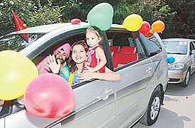 Participants of the 5th Family Fun Car Rally in a jubilant mood at Kalagram, 