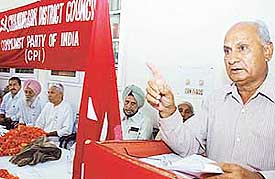 District Council secretary of the CPI Devi Dayal Sharma addresses a party convention in Chandigarh on Sunday.