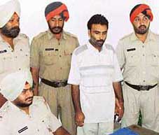 Tarsem Kumar, alias Billa, a travel agent who has been arrested by the Ludhiana police on the charge of cheating youths.