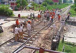 Workers repair the Ludhiana-Ferozepore line on a level crossing in Shastri Nagar without notice. The work caused inconvenience to hundreds of commuters.