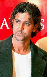 Bollywood star Hrithik Roshan poses for photographers after his appointment as a brand ambassador for John Players ITC Mens Wear