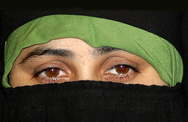 A spokespeson of the Dukhtaran-e-Millat addresses a press conference in Srinagar on Tuesday