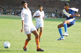 A football match between the Chandigarh Football Academy-42 and the Football Club, Nawanshahr, in progress at Football Academy-42, Chandigarh