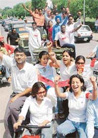 Girls take the lead in the PUSU car rally at Panjab University for the election of Campus Students Council