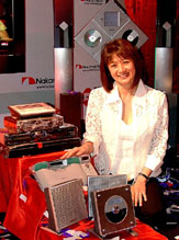 Ms Rubu Lee, Director of Nakamichi Corporation Limited poses with the newly launched Nakamichi audio video and car audio products in New Delhi on Thursday. 