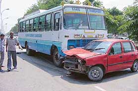Yet another accident: A collision between a Haryana Roadways bus and a car on Madhya Marg disrupted the normal flow of traffic for almost an hour in Chandigarh