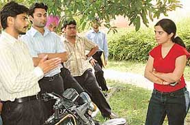 Dalveer Singh, presidential candidate of SOPU, requests for votes with folded hands in PU, Chandigarh, on Thursday. 