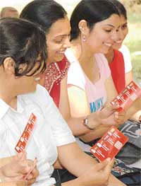 Girls take a look at the PUSU panel in PU, Chandigarh, on Thursday. 