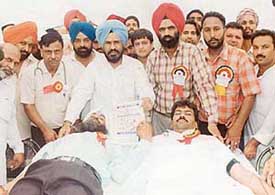 Shamsher Singh Dullo, President, Punjab Pradesh Congress, inaugurates the blood donation camp in memory of Beant Singh at Payal on Wednesday. 