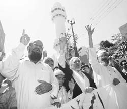 Muslim clerics shout slogans at an anti-Israel rally in Karachi on Friday.
