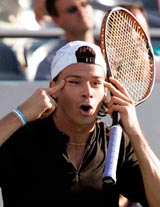 Argentinas Guillermo Coria gestures during his match against Vincent Spadea of the USA at the US Open in New York on Thursday