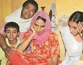 Manmohan Singhs wife, two children and a relative in a state of shock at their Burail residence in Chandigarh
