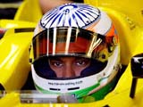 Jordans Formula One driver Narain Karthikeyan attends the third free practice session for the Italian Grand Prix at the Monza race track 
