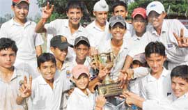 Players of DAV School Cricket Academy, Sector 8, in jubilant mood after winning the S.N. Vohra Memorial Cricket Tournament held at St Johns High School, Sector 26, Chandigarh, on Sunday. 