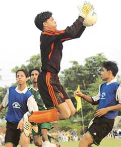 Sumit Kumar, goalkeeper of Mehar Football Academy, Kurali, in action during the Junior Challenge Football (u-17) meet at Sports Complex, Sector 42, Chandigarh