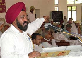 PPCC chief Shamsher Singh Dullo addresses a seminar at Ambedkar Bhavan in Jalandhar