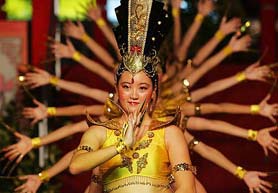 Performers dance during the opening ceremony of the Chinatown Mid-Autumn Festival in Singapore on Sunday