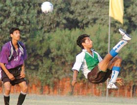 Jasmeet Singh of MFA, Kurali, attempts a bicycle kick during a semifinal match against DDA in the Chandigarh Junior Challenge Football Cup (under-17) played at the Sector 17 stadium in Chandigarh