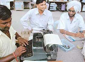 A typist at work outside the Estate Office in Sector 17, Chandigarh