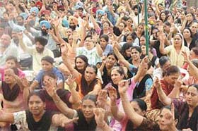 Members of the Punjab and Chandigarh College Teachers Union and the Punjab State Aided School Teachers and other employees unions protesting at the Matka Chowk in Chandigarh