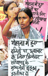 JNU students protest against Haryana Chief Minister Bhupinder Singh Hooda for his failure to prevent violence against Dalits in Gohana at Jantar Mantar in the Capital