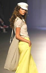 A model wears a creation of the Alianto fashion house as part of its spring/summer, 2006, collection at the Pasarela Cibeles fashion show in Madrid on Tuesday.