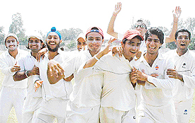 Jubilant players of Chandigarh District team after winning the first match of Katoch Shield Cricket Tournament at DAV Senior Secondary School, Sector 8, on Tuesday. 