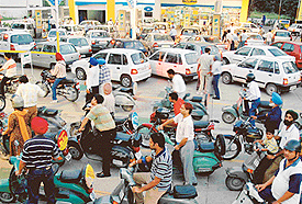 Heavy rush of vehicle owners outside petrol stations in Chandigarh following a hike in petroleum prices across the country on Tuesday.