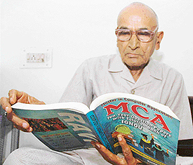 Mr Raghbir Singh in his study of the Panchkula home on Tuesday.