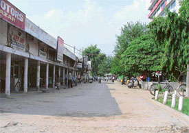 A deserted car bazaar in Feroze Gandhi Market after the police erected pillars in front of the shops of the car dealers
