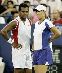 Martina Navratilova  of the USA and Leander Paes react during their match against Katarina Srebotnik of Slovakia and Nenad Zimonjic of Serbia and Montenegro at the US Open in New York