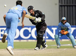 New Zealands Nathan Astle plays a shot during their tri-series final against India
