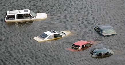 Abandoned vehicles submerged in flood waters in New Orleans, Louisiana