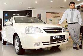 General Motors India Vice-President (Marketing) Amit Dutta poses with the newly launched Chevrolet Optra Royale in New Delhi