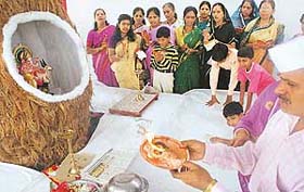 A priest performs aarti after the sthapna of a Ganesha Idol by the Vayu Sena Maharashtra Mandal in Sector 31-D, Chandigarh