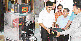 Members of the Tribune Youth Club present a water cooler and inverter to Mansa Devi Sanstha Board workers on the occasion of the death anniversary of the founder of The Tribune, Sardar Dyal Singh Majithia, which falls on Friday.