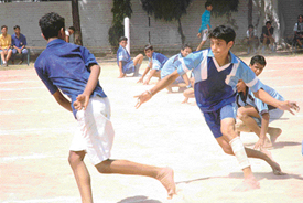 A player of DAV Public School, Sector 15, Chandigarh, tries to catch the Air Force 12 wing school player during the CBSE Cluster Kho-Kho tournament at Shishu Niketan School 22, Chandigarh, on Thursday.
