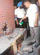 UT IGP Satish Chander inspects the site of explosion at the Sector 17 inter-state bus terminus in Chandigarh on Thursday evening.