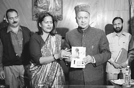 Mr Virbhadra Singh, Chief Minister, releases a book on journalism authored by Dr Vir Bala Aggarwal in Shimla on Wednesday.