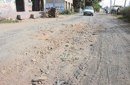 The road has become bad, especially after rains, leaving huge potholes at very short distances.