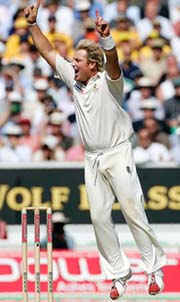 Australias Shane Warne celebrates after dismissing England captain Michael Vaughan during the first day of the fifth Ashes Test at the Oval on Thursday. 