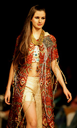 A Lebanese model displays an outfit by Saudi Arabian designer Qassem al-Qassem Sheikhly 