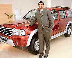 Mr P. Umashankar, General Manager, Customer Service Operations, Ford India, stands in front of the Ford Endeavour Special Edition