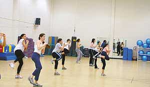 Kickboxing combines aerobics and cardio-vascular activity with self-defence tactics