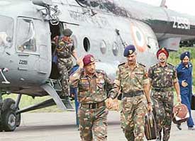 GOC-in-C, Western Command, Lieut-Gen S. Pattabhiraman (left) arrives at Chandimandir along with other officers after visiting Kharo in Kinnaur where a Bailey bridge being built by the Army had collapsed two days ago. 