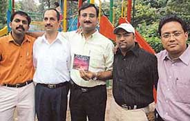 Dr Raman Abrol (centre) flanked by Dr Sahul Bharti, Dr Biman Saikia, Dr Hemant Hardikar and Anurag Sharma, the music composer, release music album Prayas. 
