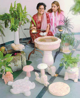 Sheila Mamik with her friend Avneet Chahal display their garden accessories at an exhibition in Sector 4, Chandigarh, on Monday. 