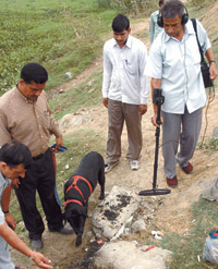 A bomb squad of the Delhi Police examining the site where a crude explosive blew up in Adarsh Nagar area in the Capital on Saturday. 