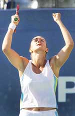 Mary Pierce of France celebrates her victory over Elena Dementieva of Russia in the semifinals of the US Open in New York on Friday. 