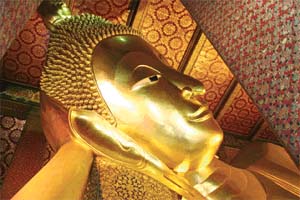 The head of the Reclining Buddha at the Wat Pho temple in Bangkok